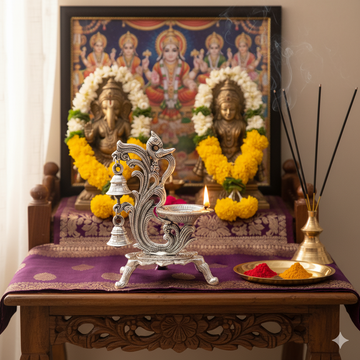 Silver Peacock Diya with Bell – Elegant Traditional Decorative Diya Stand