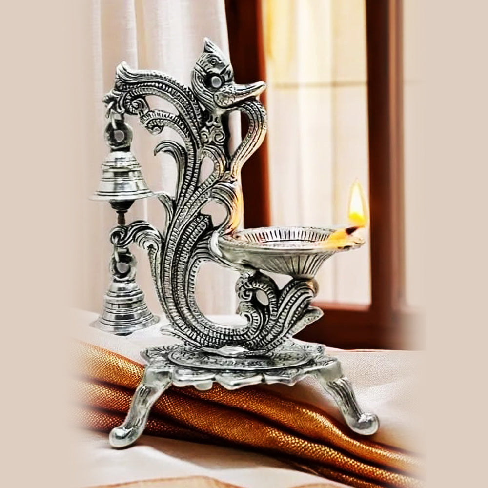 Silver Peacock Diya with Bell – Elegant Traditional Decorative Diya Stand